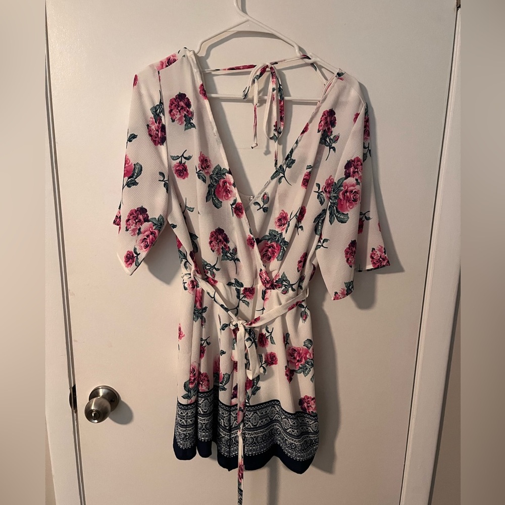Size extra large Francesca’s romper.